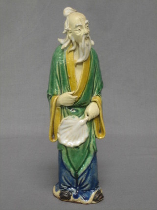 An Oriental figure of a standing sage 9"