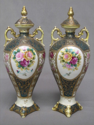 A pair of Japanese Noritake twin handled urns and covers 12" (1 f and r)