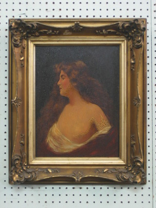 19th Century oil painting on board head and shoulder portrait of a lady 12" x 9", contained in a gilt frame (some fire damage)