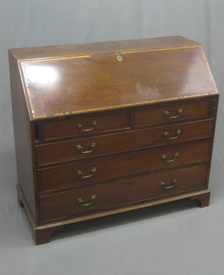 A Georgian mahogany bureau, the fall front revealing a well fitted interior above 2 short and 3 long graduated drawers with brass swan neck drop handles, raised on bracket feet 47"