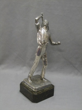 After Zwick, a silver plated tennis trophy in the form of a standing tennis player 14"