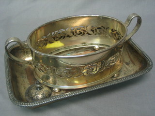 A pierced silver plated dish frame 8" and an entree dish base