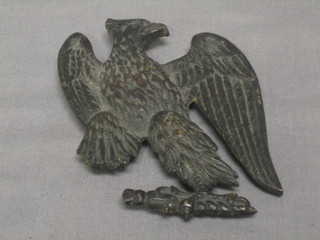 A bronze badge in the form of an "Eagle" (f), 4"