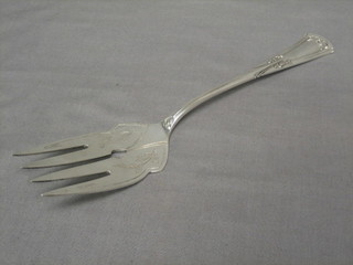 A Continental white metal fish serving fork marked 800