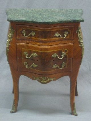 A 20th Century French Kingwood bedside commode of serpentine and bombe form, having a green marble top fitted 3 long drawers raised on cabriole supports 24"