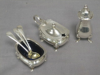 A 3 piece silver cruet set comprising mustard pot, salt and pepper with blue glass liners (marks rubbed) together with 3 silver plated condiment spoons, 3 ozs