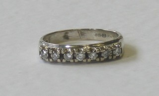 An 18ct yellow gold half eternity ring set diamonds