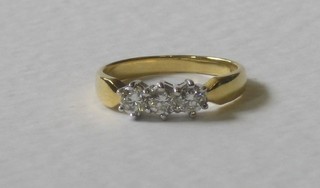 An 18ct yellow gold dress ring set 3 circular cut diamonds approx 0.50ct