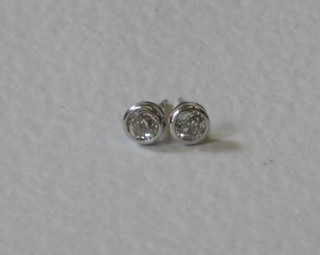 A pair of old cut diamond ear studs approx. 0.6ct in total 