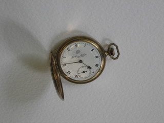 A gentleman's full hunter pocket watch contained in a gold plated case