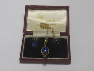 A pair of Lapis Lazuli ear studs and ditto pendant