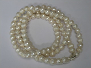 A string of white freshwater pearls