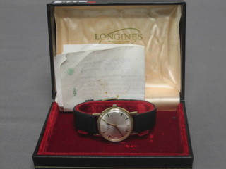 A gentleman's Longines wristwatch contained in a gold case, boxed