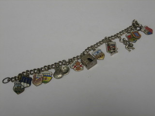 A silver charm bracelet hung various charms