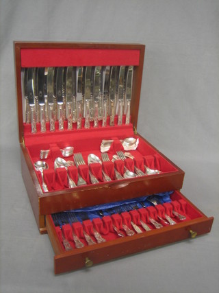 A canteen of Kings pattern flatware contained in a mahogany canteen box