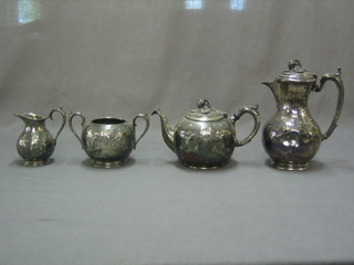 A 4 piece Britannia metal tea service comprising teapot, hotwater jug, twin handled sugar bowl and cream jug