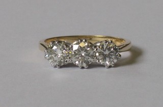 An 18ct yellow gold dress ring set 3 diamonds, approx 1.90ct