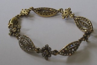 A lady's 18ct yellow gold bracelet set old cut diamonds, approx 8ct