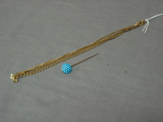 A gilt metal stick pin set turquoise together with 2 gilt metal chains