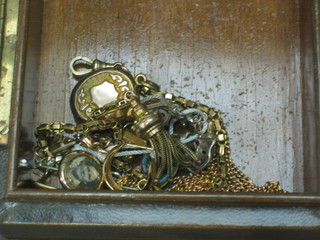 A gilt metal Langtree watch chain and a collection of various charms, gilt metal items etc