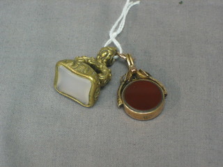 A 9ct gold seal and a gilt metal seal