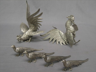 2 silver plated table ornaments in the form of fighting cocks and 4 others in the form of peacocks