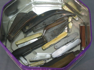 A collection of various folding knives