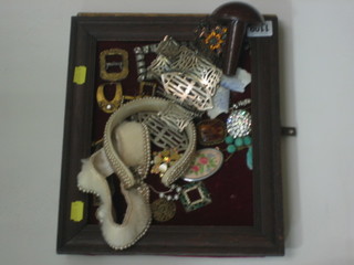 A silver plated belt, various buckles etc