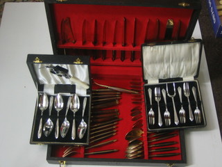 A canteen of Indonesian gilt metal flatware, a set of 6 silver plated pastry forks, 6 silver plated grapefruit spoons cased