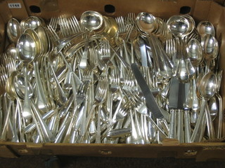 A large collection of silver plated table flatware including 12 table spoons, 17 soup spoons, 30 dessert spoons, 8 coffee spoons, 3 jam spoons, 1 honey spoon, 5 tea spoons, 26 fish forks, 26 large forks, 26 dessert forks, 27 fish knives, 27 large knives, 40 small knives, 23 serrated knives, 6 pastry knives and 12 ladles