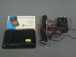 A Champion CH50 electric balance, 1 other electric balance, a spring balance and 2 jewellers loops