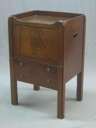 A Georgian mahogany tray top commode fitted a cupboard and having a drawer 20"