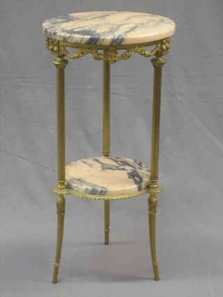 A circular gilt metal occasional table with pink veined marble top 14"