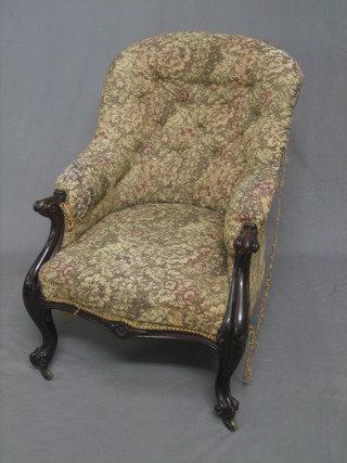 A Victorian mahogany show frame tub back chair raised on cabriole supports