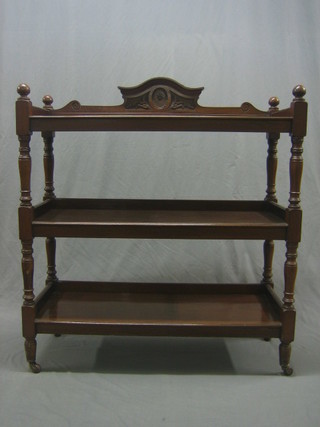 A Victorian mahogany 3 tier buffet, raised on turned and block supports 41"