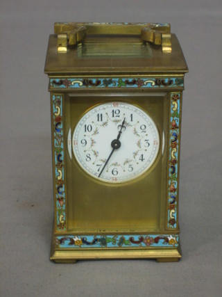 A 19th Century French 8 day carriage clock with enamelled dial and Arabic numerals contained in a champs leve enamelled case
