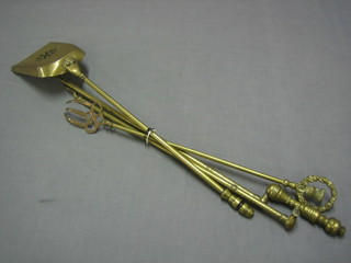A pair of brass fire tongs (f), a toasting fork and a coal shovel