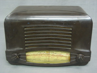 A Cossor model 464 AC radio contained in a brown Bakelite case