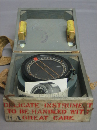 A magnetic aeroplane compass type P.8 contained in a wooden box