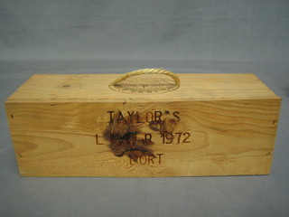 A bottle of Taylor's 1972 Late Bottled Vintage Port, contained in a wooden box