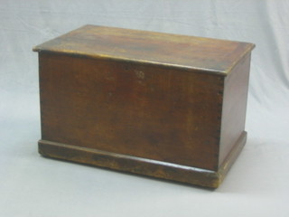 A 19th Century pine trunk with hinged lid, the interior fitted a candle box 31"