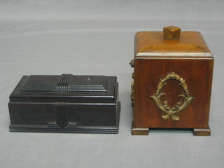 An Art Deco black Bakelite trinket box with hinged lid 7" together with a square oak finished biscuit barrel