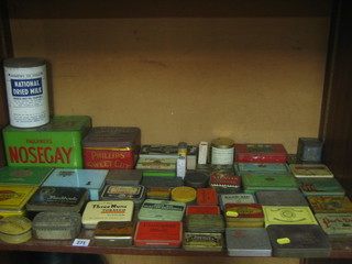 A large collection of various tins etc
