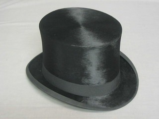 A gentleman's black top hat, approx size 7, complete with box