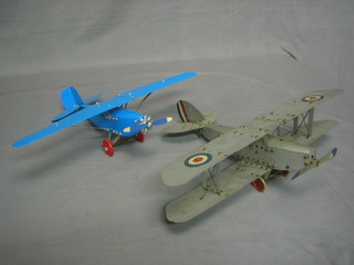 A Meccano model of a Royal Air Force Bi-plane 18", together with a blue pressed metal model of an aircraft with parasol wing 18"