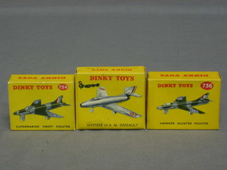 A Dinky model of a Vickers Hawker Hunter no. 736, a Dinky model of a Supermarine Swift Fighter no. 734 and a Dinky model of a  Mystere IV A. M. Dassault 60A, all boxed