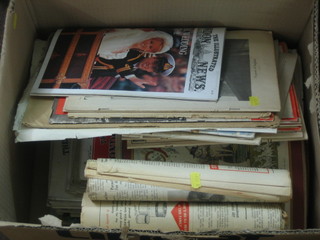 A large cardboard box containing a collection of various ephemera etc