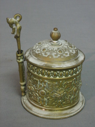 A Victorian cylindrical embossed brass spring box 4"