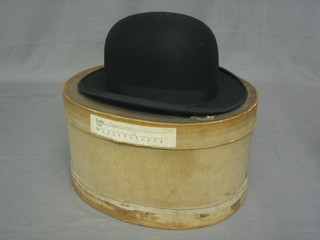 A light weight bowler hat by Christie, approx size 7