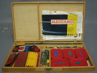 A red and yellow Meccano set, boxed